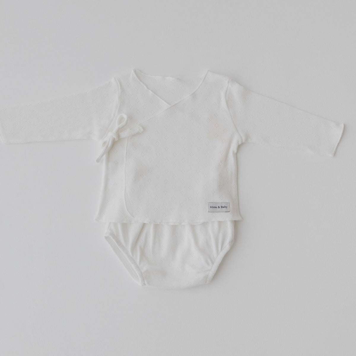 Camiseta y cubrepañal Ivory