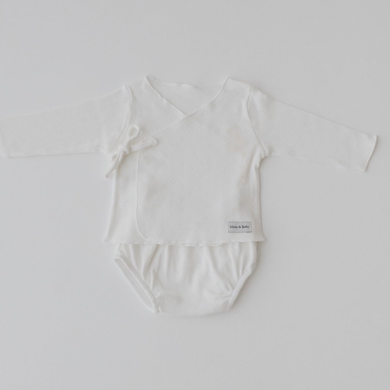 Camiseta y cubrepañal Ivory