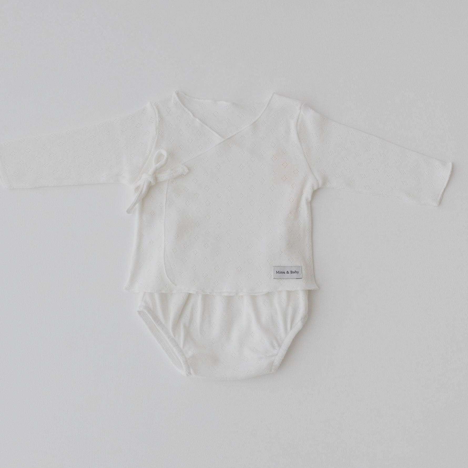 Camiseta y cubrepañal Ivory